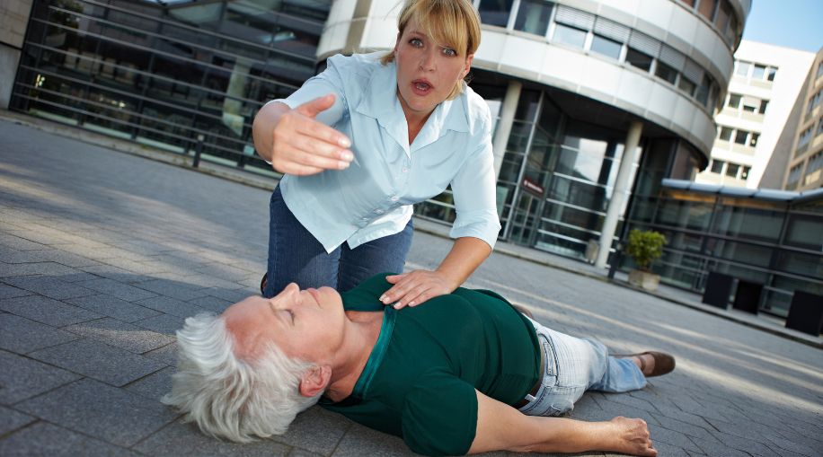 seizure causes - woman lying on ground